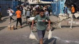 Thousands Break Into UN Aid Depots In Gaza Looking For Food