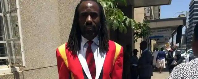 MDC-T MP forced to remove jacket with national flag colours. Threatens to take legal action