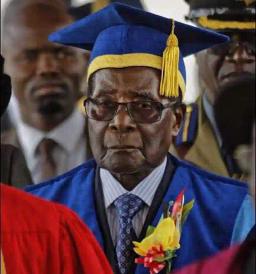 Mugabe officiates Zimbabwe Open University (ZOU) Graduation in same shirt he wore for negotiations?