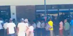PICTURE: Police Officers On Duty Queuing For Mealie Meal As Mealie Meal Shortages Intensify