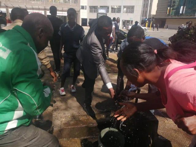 PICTURES: Tear Smoke Forces Citizens To Scamper For Water At Africa Unity Square