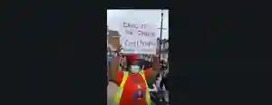 UK-Based MDC Alliance Activist In Anti-ZANU-PF Campaign During #BlackLivesMatter March