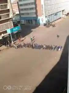 WATCH: Anti-riot Police Beating Up Protestors In Harare