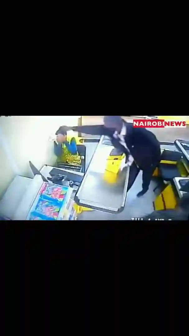 Watch: Man Caught On CCTV Camera Savaging Supermarket Cashier