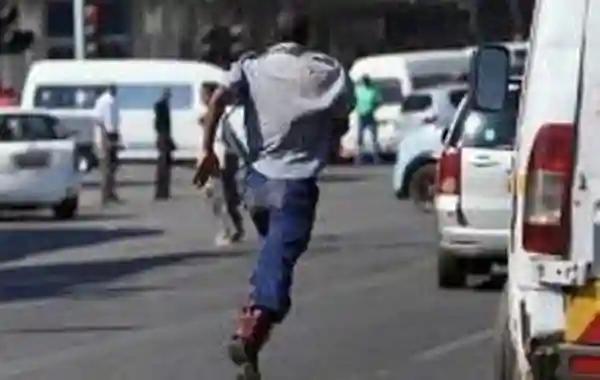 WATCH: Masses Beat Police Officer Who Was Caught Stealing