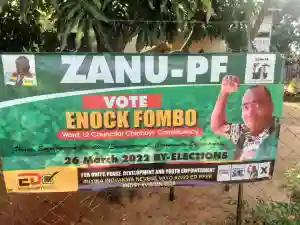 ZANU PF Candidate Erects Campaigning Banners Close To Polling Station